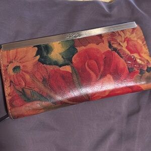 Patricia Nash real leather wallet. Roughly nine inches long. One owner